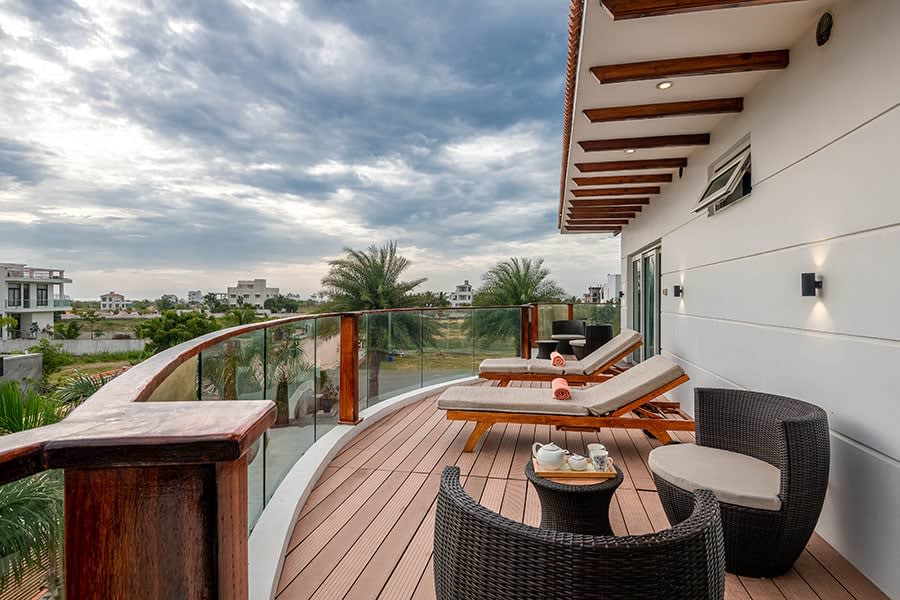 Balcony view from Christmas villa, beach chairs and outdoor seating