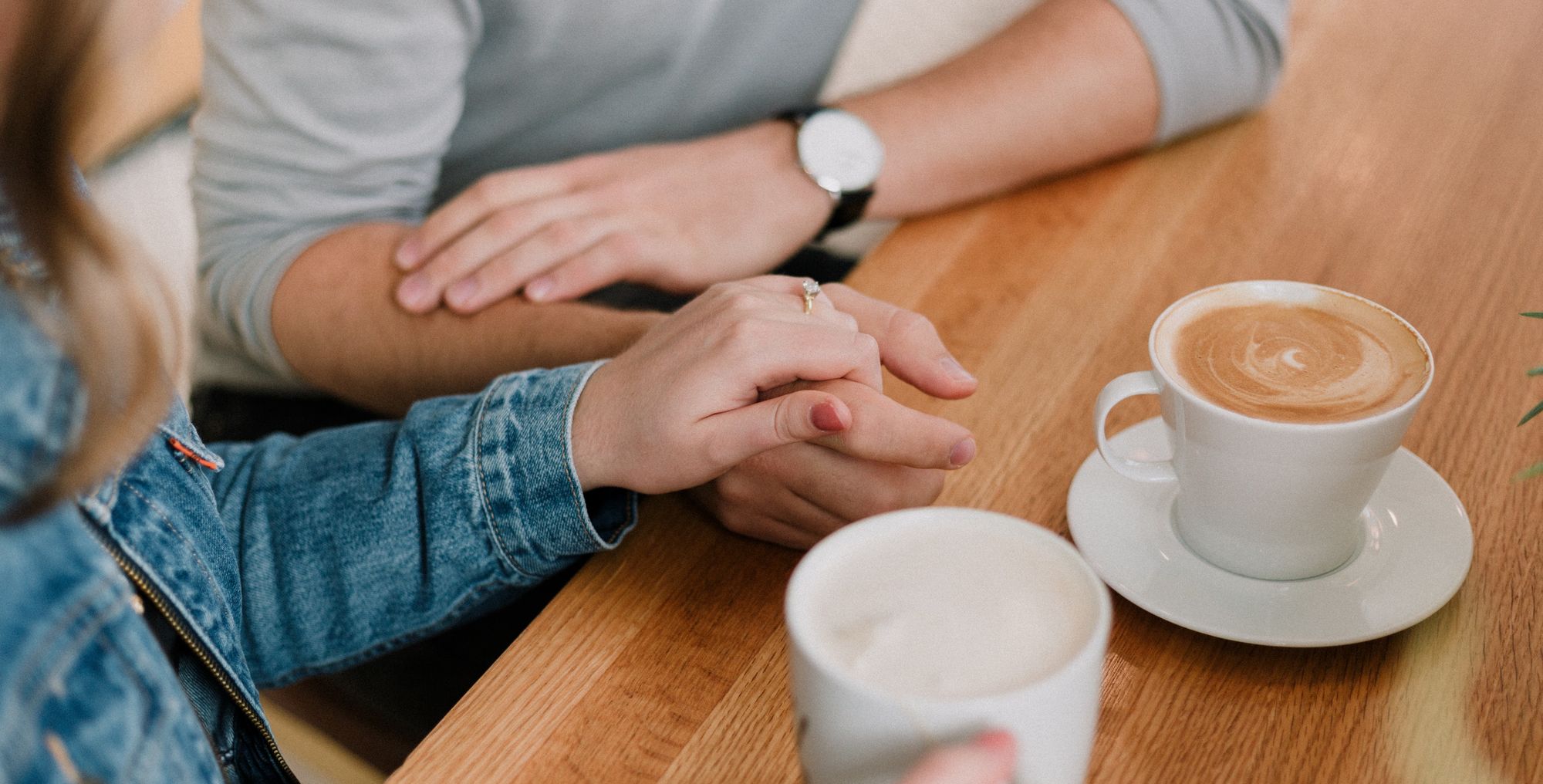 man and woman holding hands