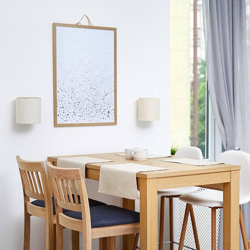 A small dining table with exactly of feel of a restaurant with a very bright colour and wall colour also as bright as modern dining room ideas