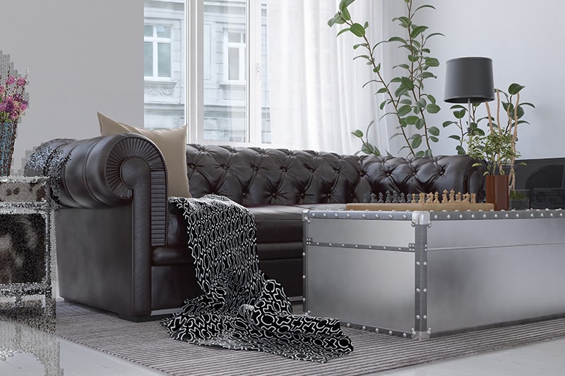 Leather sofa design for living room interiors with a brown leather chesterfield fits