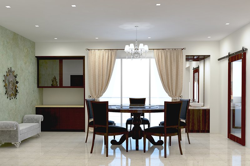 Modern dining room chandelier with dedicated dining space with a round dining table