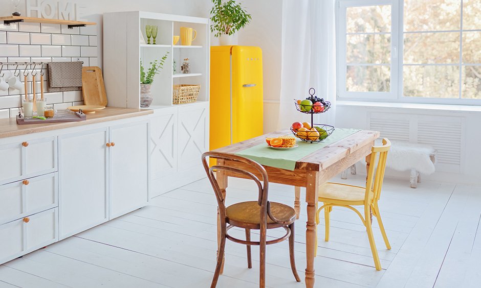 Small dining room design ideas with country style wooden table and white coloured walls look gorgeous.