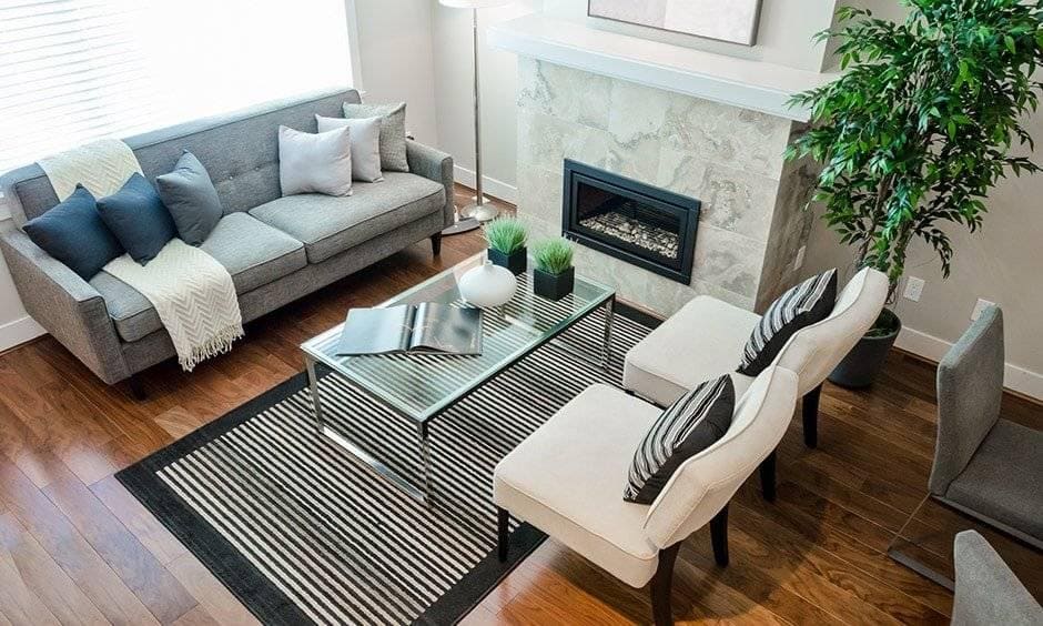 Beautiful glass coffee table design in black and white themed living room