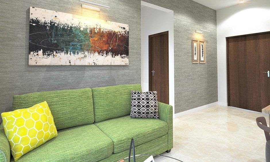 Grey living room images for indian homes with green coloured sofa