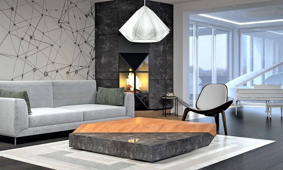 Grey living room with grey marble walls of the fireplace and patterned accent wall