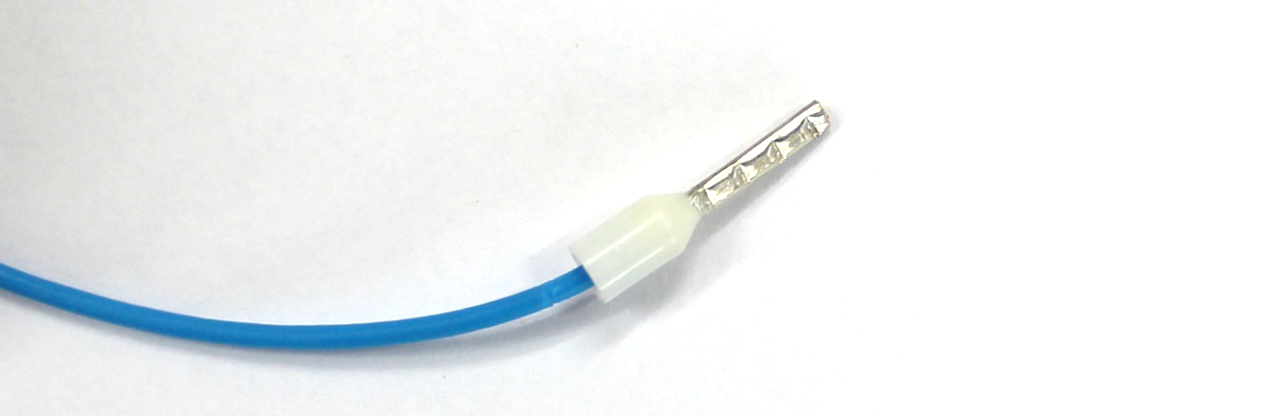 Blue Rheonics sensor cable with 8 mm crimped sleeve prepared for connection to SME transmitter terminal block.